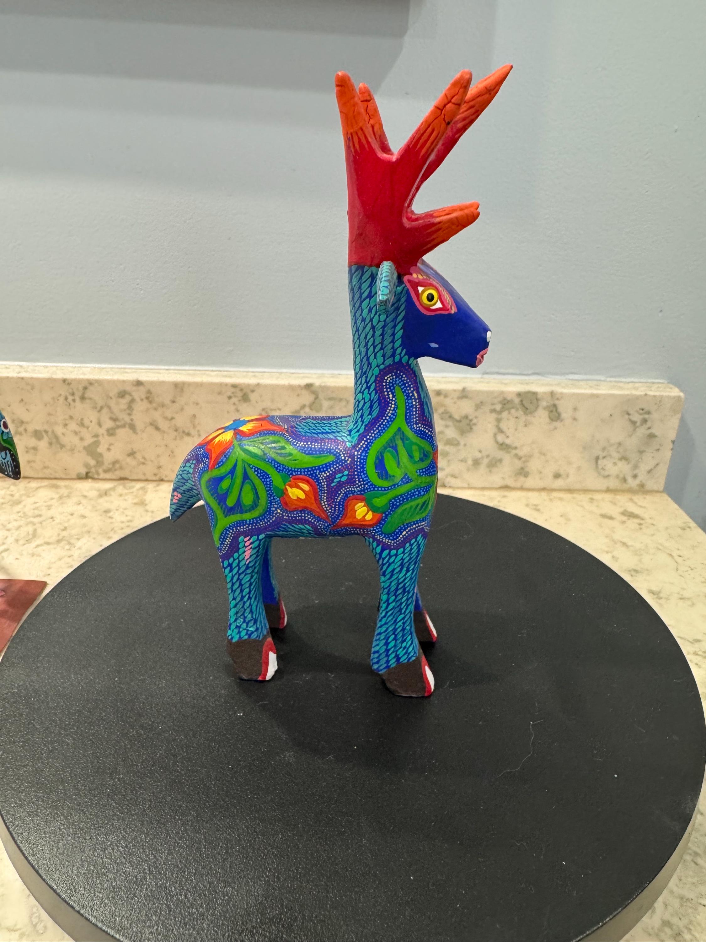 A Signed Raymundo Santiago Oaxacan Alebrije Wooden Deer Sculpture