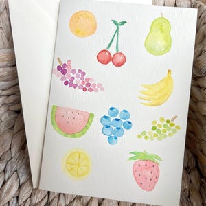 Carte de voeux aquarelle peinte à la main de drôles de fruits colorés