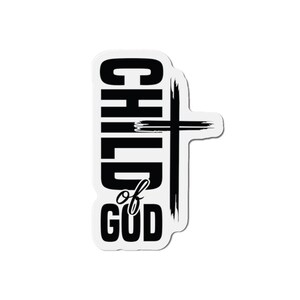 Peut inclure: Un autocollant blanc avec l'inscription "CHILD of GOD" en lettres noires grasses, accompagné d'une croix noire. Le design est vertical et de forme légèrement irrégulière.