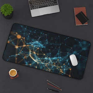 May include: A rectangular desk mat featuring a dark background with a digital network pattern of interconnected blue and gold lines and nodes. The mat is positioned on a dark surface alongside a laptop, a notebook, a white computer mouse, a cup of coffee, and pens.