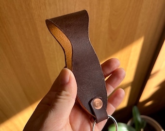 Grote sleutelhanger met leren lushandvat