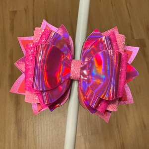 Holographic, shimmering, glittery and matte dark pink tumbler bow