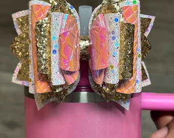 Textured pink, sparkly light pink, and sparkly gold tumbler bow