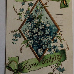 Antique Birthday Postcard from 1910 - Unique Signature & Handwritten Message, Featuring Age Damage and Historic Postmark and 1 cent Stamp