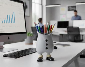 May include: A whimsical white pen holder shaped like a person, with three black buttons and black shoes. The holder is filled with colorful pens and pencils, sitting on a white desk in an office setting.