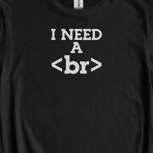 May include: Black t-shirt with white text that reads "I need a <br>"