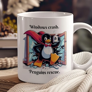 May include: White ceramic mug with a cartoon penguin wearing a red cape and holding a cup of coffee. The text "Windows crash. Penguins rescue." is printed on the mug.