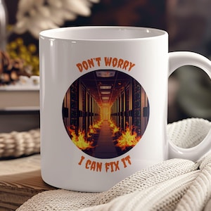 May include: White ceramic mug with a black and orange design. The design features a server room with flames and the text "Don't Worry I Can Fix It".