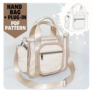 May include: A beige handbag with a zippered pocket and a detachable shoulder strap. The bag has a plug-in design and comes with a PDF pattern. "HAND BAG + PLUG-IN PDF PATTERN" is written on the image.