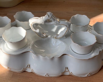Hueveras y soporte de porcelana antigua, decoración de mesa de porcelana.