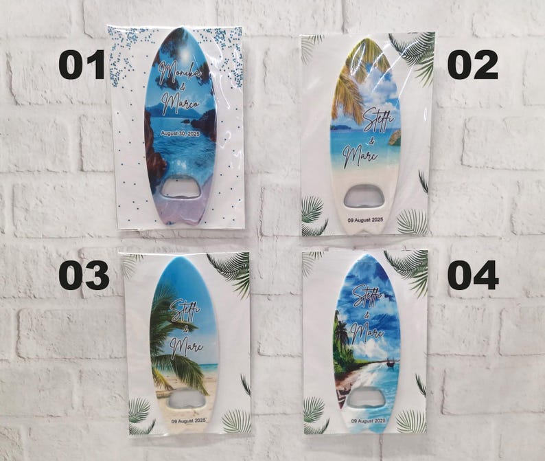 May include: Surfboard-shaped bottle openers with beach scenes. Each opener has a different design, with names and dates printed on them. The openers are packaged in clear plastic with decorative accents. The overall theme is a beach wedding.