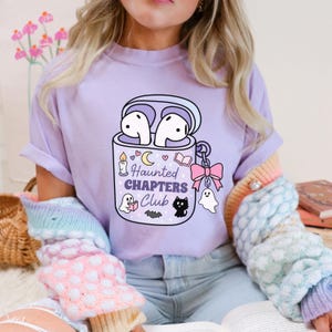 Halloween bookish ghost t-shirt png design mockup.