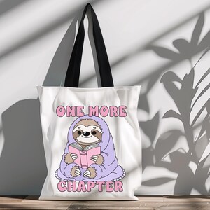 A bookish tote bag png mockup of the One More Chapter sloth clipart.
