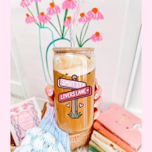 Romance book lover cup with smut png design on it.
