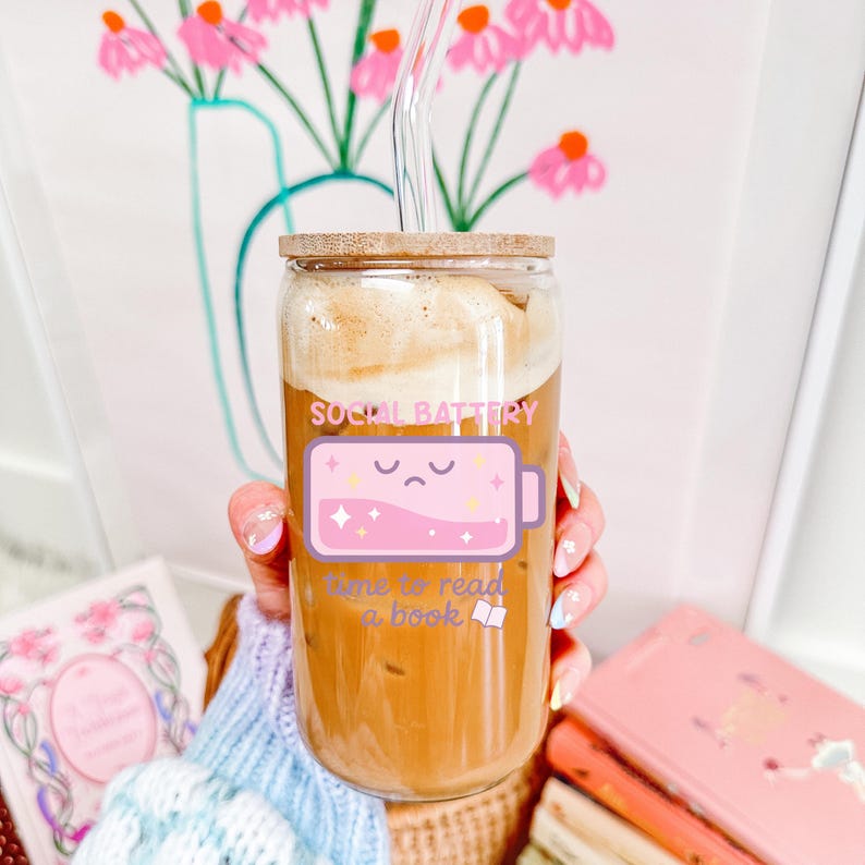 Cute bookish introvert cup png design