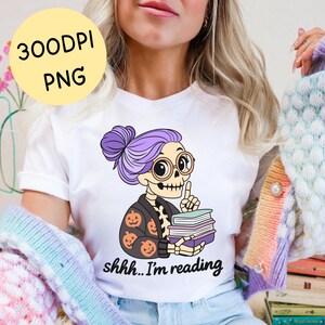 Shh I'm reading shirt design png file of a spooky librarian skeleton