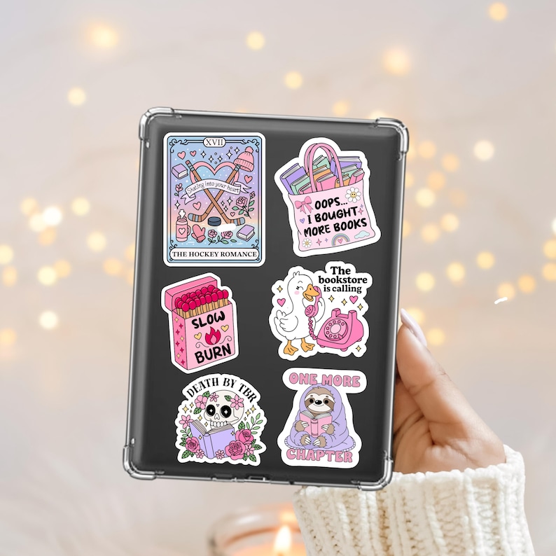 Girly bookish sticker png designs as stickers on the back of a kindle