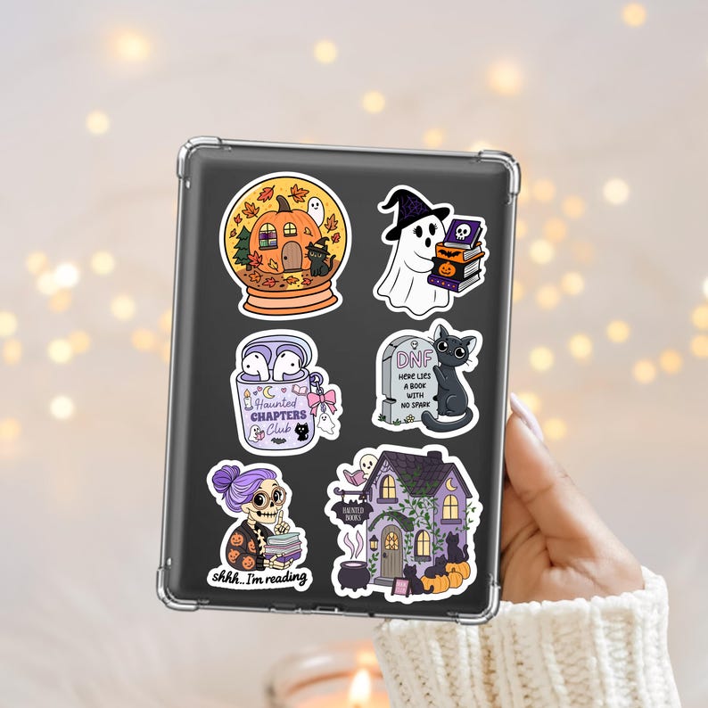 Halloween themed bookish pngs I sell on my store, mocked up as kindle stickers.