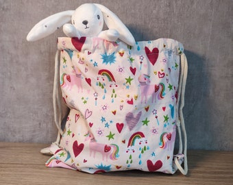 children's pouch backpack, cuddly toy