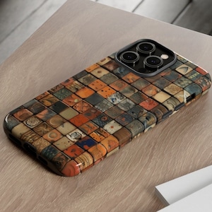 May include: A phone case with a colorful mosaic pattern. The case is made of a durable material and has a raised camera bump to protect the phone's lenses.
