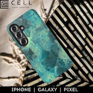 May include: A teal phone case with a geometric pattern, featuring a camera array. The case is branded with the text "CELL CASE CRAFTER" at the top and the words "IPHONE | GALAXY | PIXEL" at the bottom. The case is displayed on a decorative surface.
