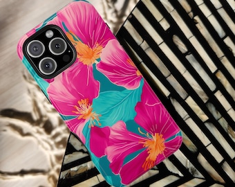 May include: A phone case with a vibrant floral design. The case features large pink flowers with orange centers and teal leaves against a teal background. The brand name "CELL CASE CRAFTER" is printed at the top.