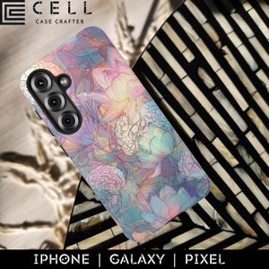 May include: A smartphone case with a floral design in pastel colours. The case features a pattern of flowers and brain-like shapes in shades of pink, blue, and purple. The case is labelled with the text "IPHONE | GALAXY | PIXEL". The brand name "E CELL CASE CRAFTER" is also visible.