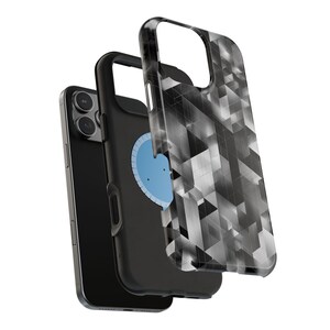 May include: A black smartphone with a triple-lens camera is shown with a black phone case and a geometric patterned case. The geometric case has a black and white design. A light blue circle is visible on the back of the phone.