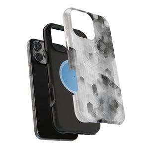 May include: A black smartphone with a protective case. The clear cover has a geometric design in grey and white. The case is layered, revealing the phone's camera and a blue circular element.