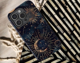 May include: A black phone case with a celestial design featuring a gold crescent moon, sun, and stars on a dark blue background. The text "CASE CRAFTERS" is printed on the case.