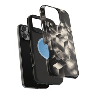 May include: Black smartphone with a protective case. The case has a geometric pattern in shades of gray and white. The phone is partially disassembled, showing the phone's back and a blue circular design.
