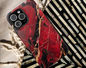 May include: A red, black, and gold marble phone case with a camera cutout. The case is designed to fit a smartphone with a triple camera system. The case is made of a durable material and has a sleek, modern design.