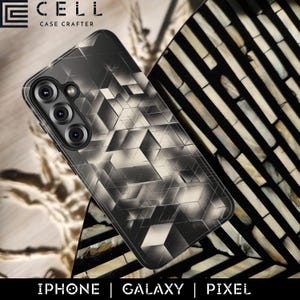 May include: A black and gray phone case with a geometric cube design. The case is for an iPhone, Galaxy, or Pixel phone. The brand name "CELL CASE CRAFTER" is printed at the top.