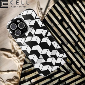 May include: A black and white geometric patterned phone case with the text "CELL CASE CRAFTER" in the upper left corner. The case has a glossy finish and a camera cutout. The case is on a decorative surface.