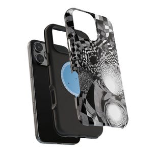 May include: Black smartphone with a black case and a separate case with a black, white, and gray geometric design. The phone case has a blue circle with a white design.