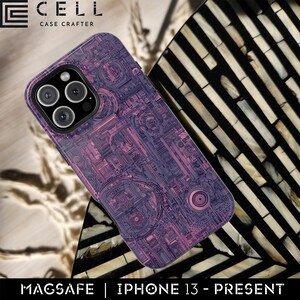 May include: A purple and pink patterned phone case with a complex, mechanical design. The case is for an iPhone 13 or newer model and is MagSafe compatible. The case is on a black and white patterned surface. The brand name "CELL" is visible.