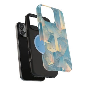 May include: A black smartphone with a protective case featuring a colorful architectural design of stairs and buildings in shades of blue, yellow, and peach. The case is detached, showcasing the phone's camera.