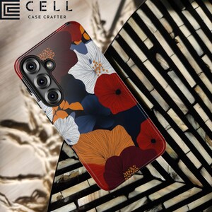 May include: A smartphone case with a floral design. The case features a dark background with orange, red, white, and blue flower illustrations. The brand name "E CELL CASE CRAFTER" is printed at the top.