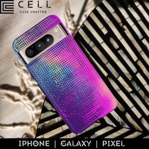 May include: A smartphone case with a vibrant gradient design in shades of purple, pink, and blue. The case features a dotted pattern and is designed for iPhone, Galaxy, and Pixel phones. The brand name "CELL CASE CRAFTER" is visible at the top.