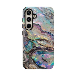 May include: A smartphone case with a pearlescent, iridescent design. The case features a swirling pattern of colors including blue, green, purple, and silver. The case has a camera cutout with three lenses.