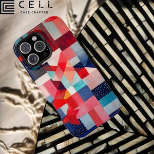 May include: A colorful phone case with a geometric pattern in shades of red, blue, yellow, and white. The case has a black background and a white border. The case is designed for an iPhone 13 Pro.