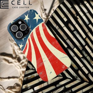 May include: A red, white, and blue phone case with a distressed American flag design. The case is made for an iPhone and has a raised camera bump. The case is on a white and black background.