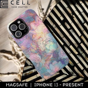 May include: A phone case with a floral design in pastel colors, including pink, blue, and purple. The case has a glossy finish and features a detailed illustration of flowers and brain-like shapes. The case is designed for an iPhone 13 and is MagSafe compatible.