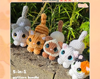 May include: Five crocheted cat plushies in various colors including grey, orange, brown, white, and calico. Each cat features large dark eyes, pointed ears, and an upright tail. The text reads Crochet Pattern, Difficulty, 5-in-1 pattern bundle, The Lazy Cats.