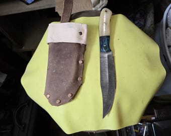 Hand forged hunting knife damascus