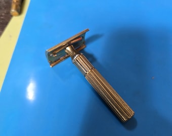 Vintage 1940's gold tone razor Gillette