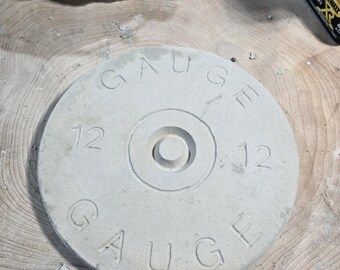 Hand made cement shot gun shell stepping stone
