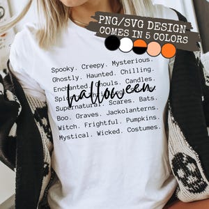 May include: White t-shirt with a Halloween-themed design. The shirt features a list of spooky words and phrases, with the word "Halloween" in a handwritten font. The design is available in five colors.