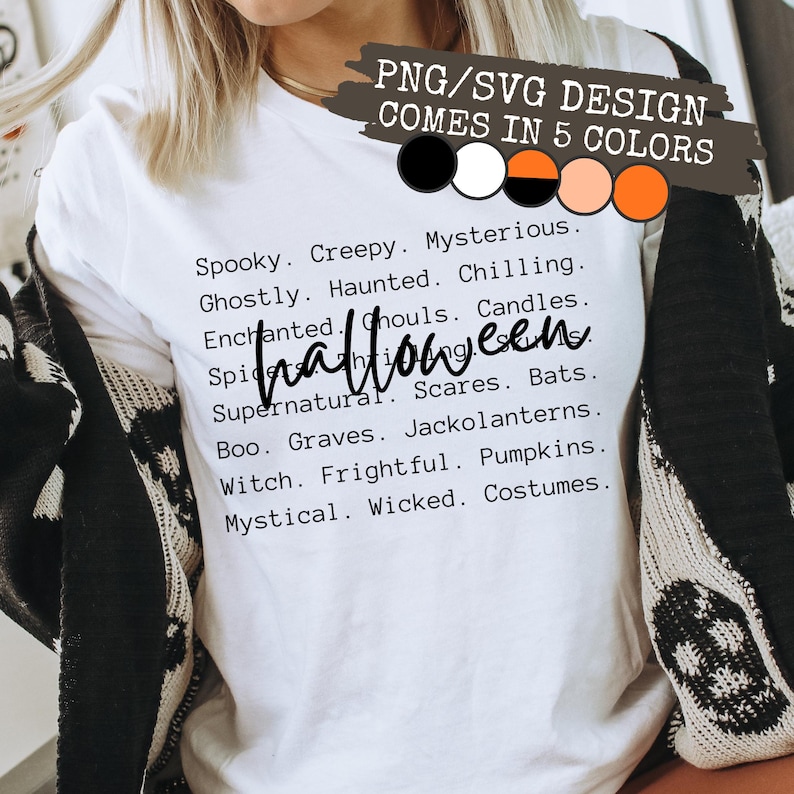 May include: White t-shirt with a Halloween-themed design. The shirt features a list of spooky words and phrases, with the word "Halloween" in a handwritten font. The design is available in five colors.
