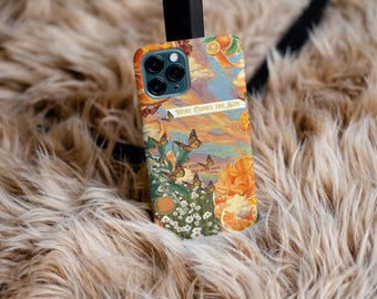 May include: A colorful phone case with a sunset scene, butterflies, and oranges. The text "Here Comes the Sun" is printed on the case.